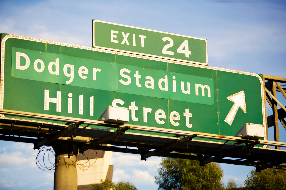 Freeway sign "Exit 24. Dodger Stadium Hill Street"